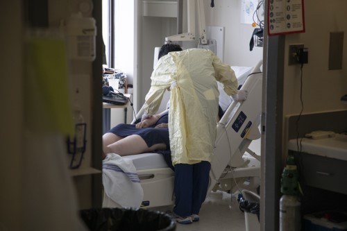 Patient and nurse in the ICU